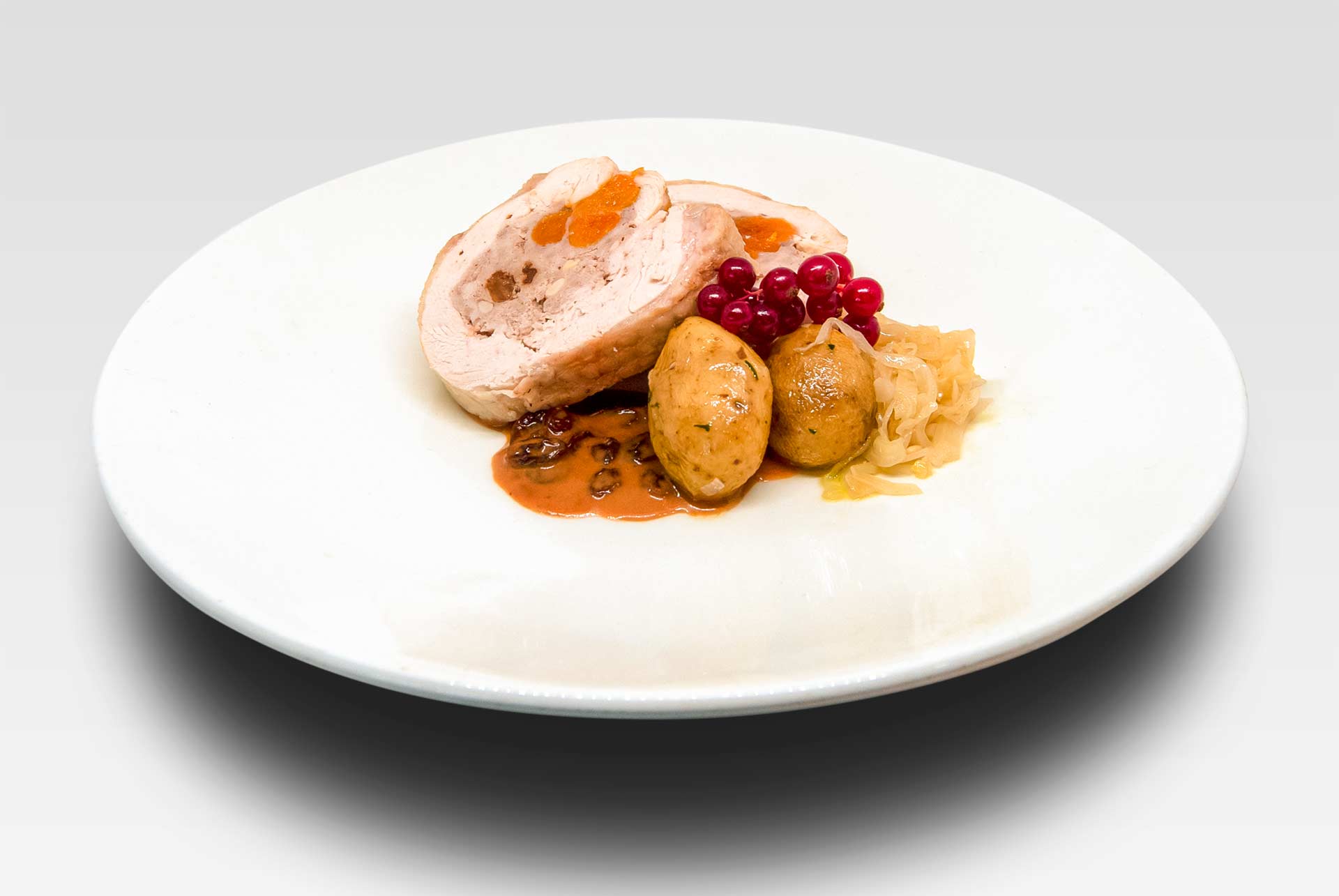 Medallón de Pavo Tradicional Relleno con Salsa de Trufa